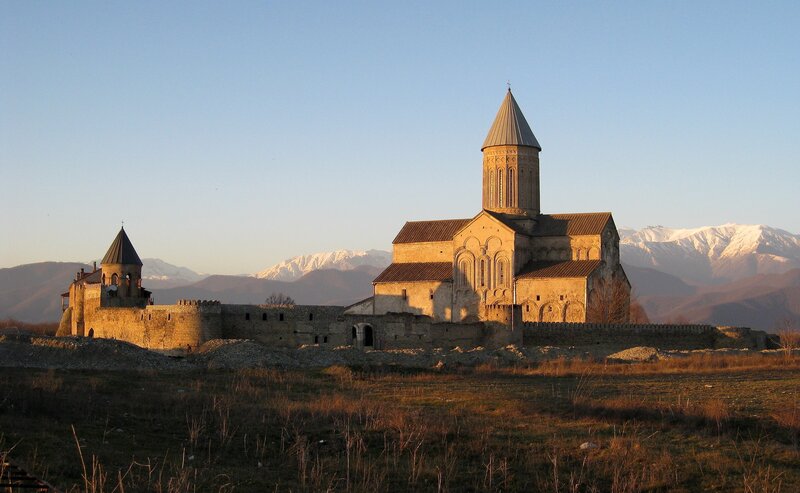 medieval monastery with mountains