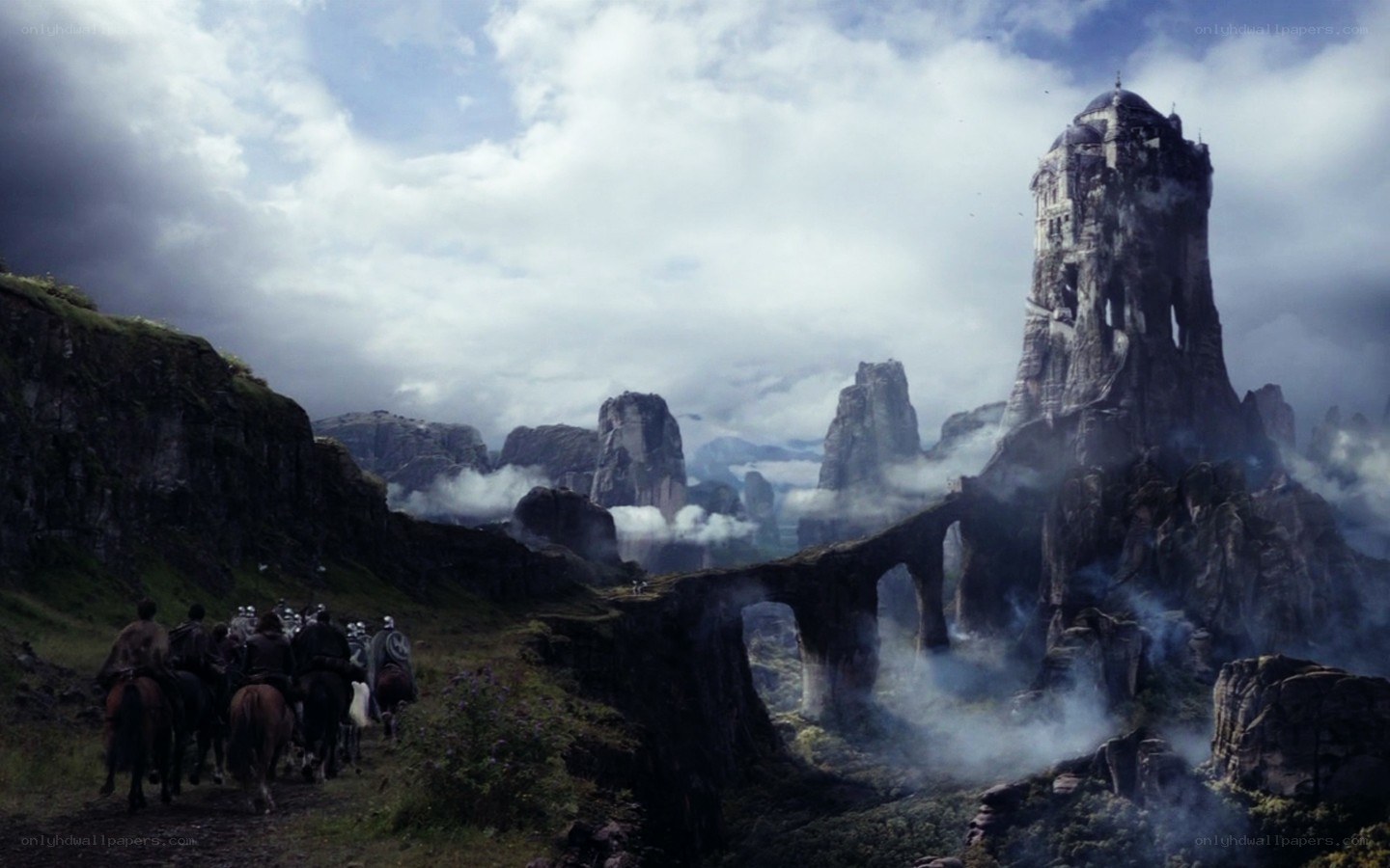 Medieval riders approach ancient tower