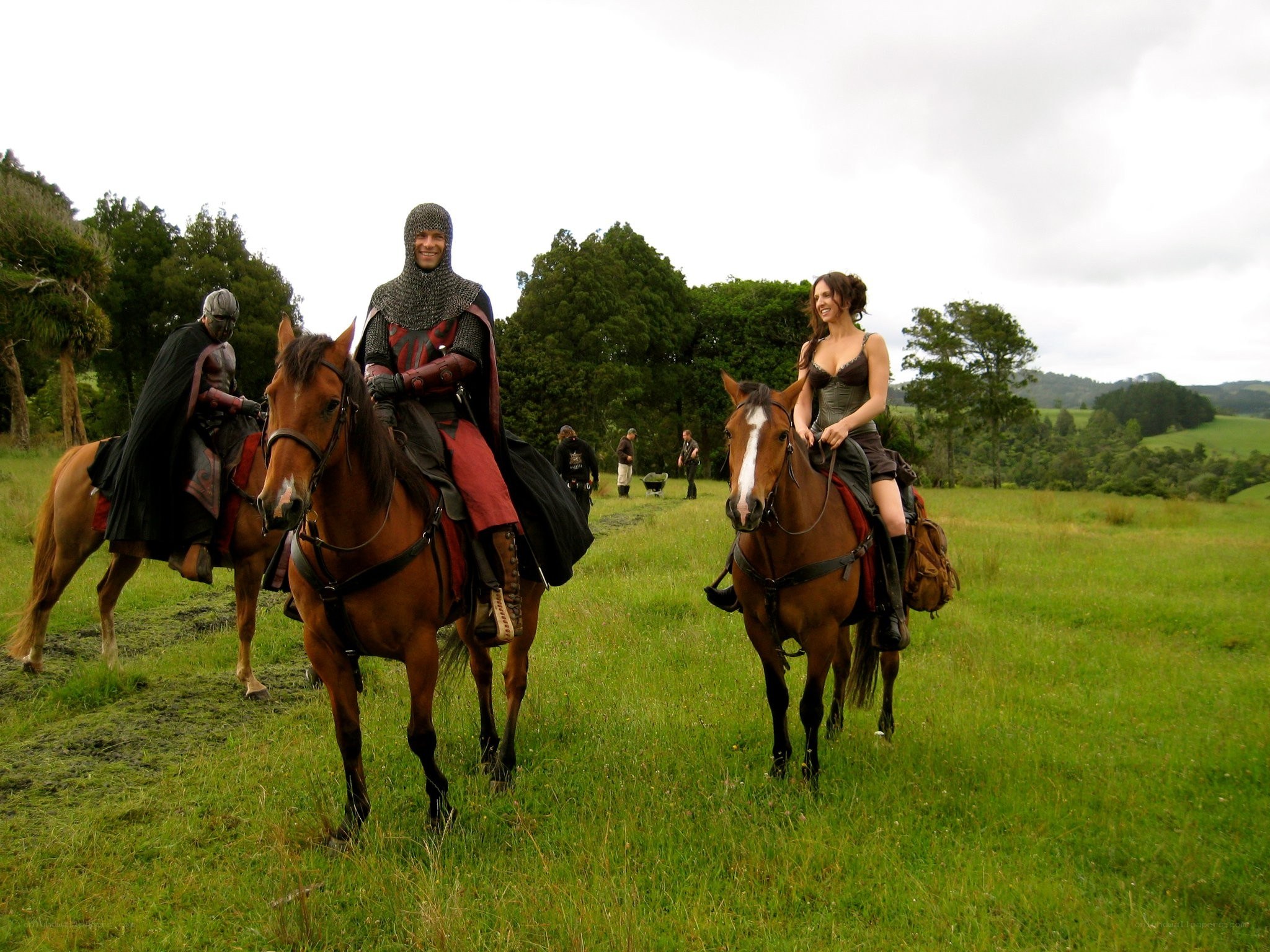 Medieval riders in a field