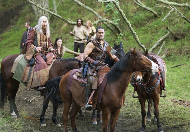 Medieval riders in forest
