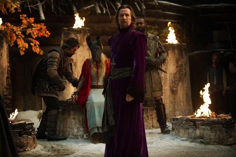Medieval scene with purple-robed man