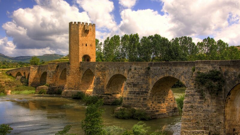 Medieval stone bridge over river