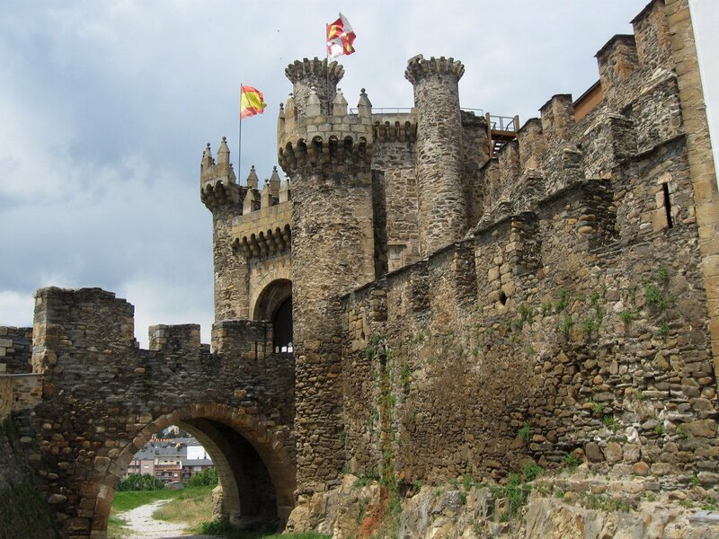 Medieval stone castle with flags
