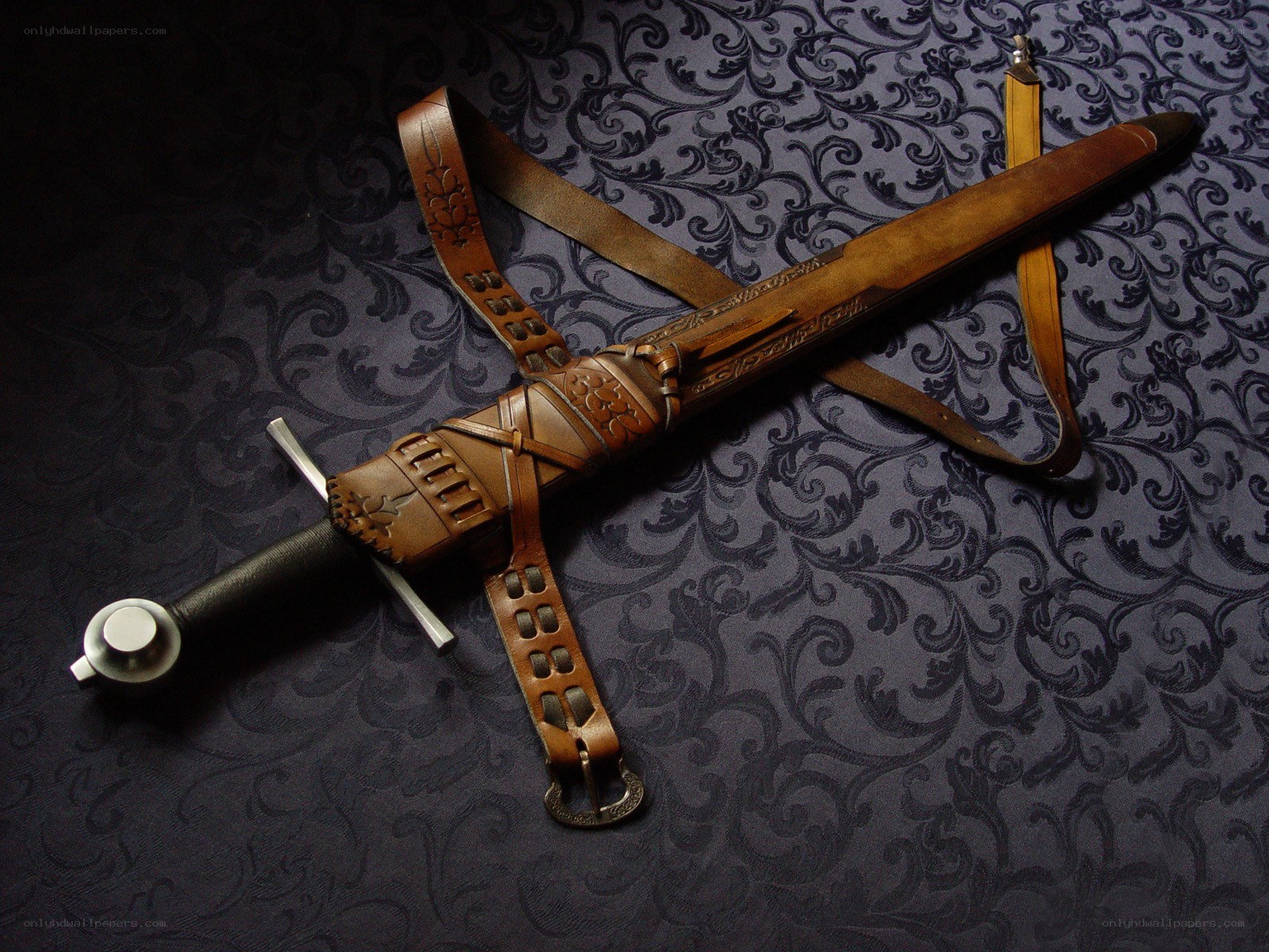 Medieval sword in leather sheath