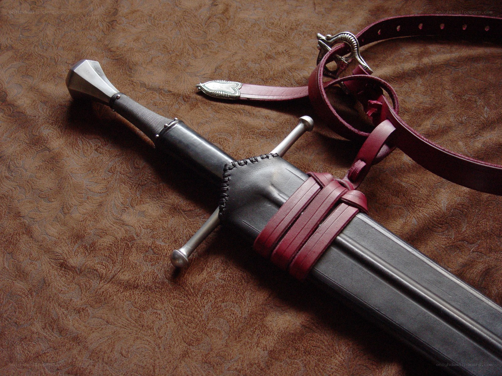 Medieval sword in leather sheath
