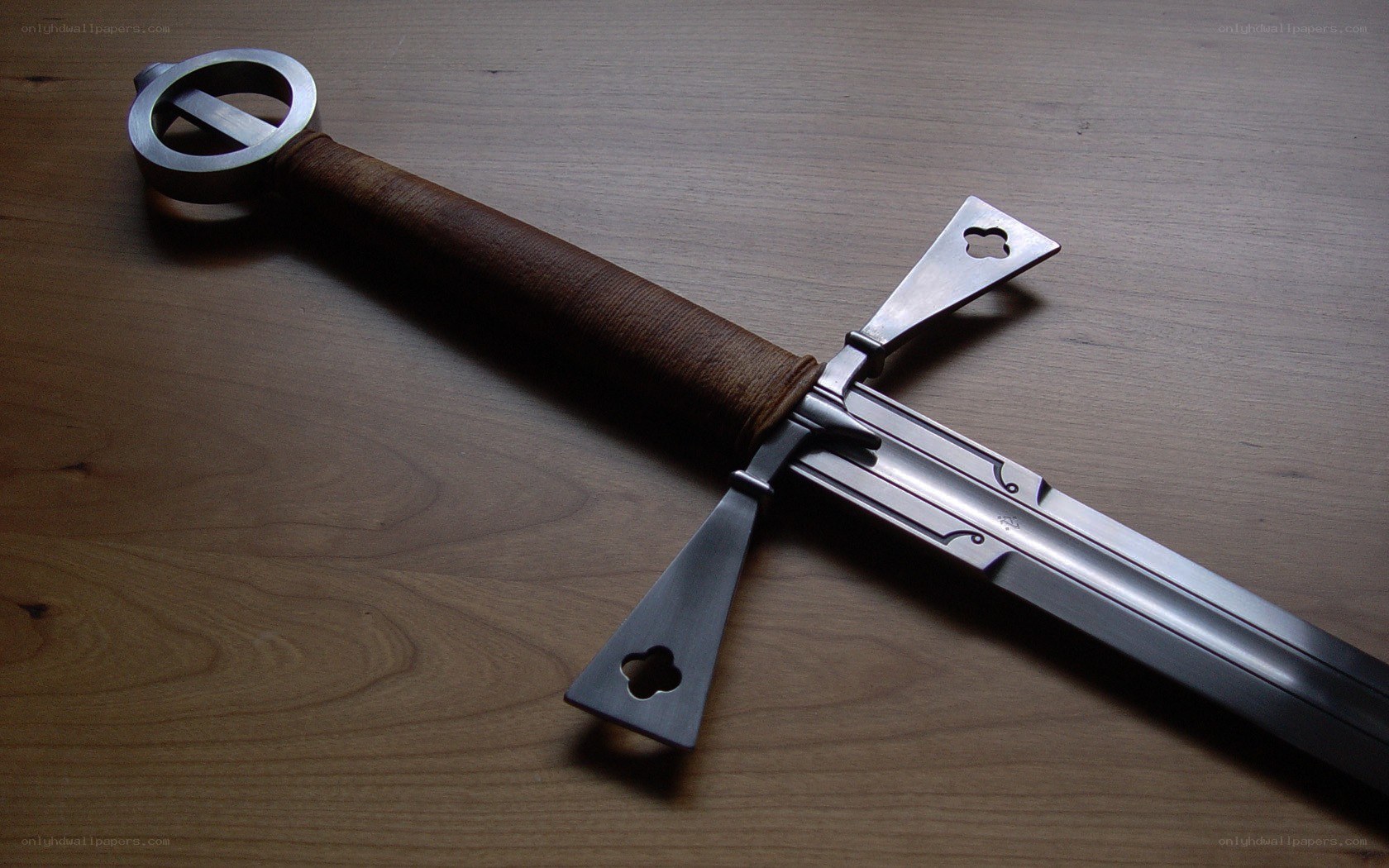 medieval sword on wood