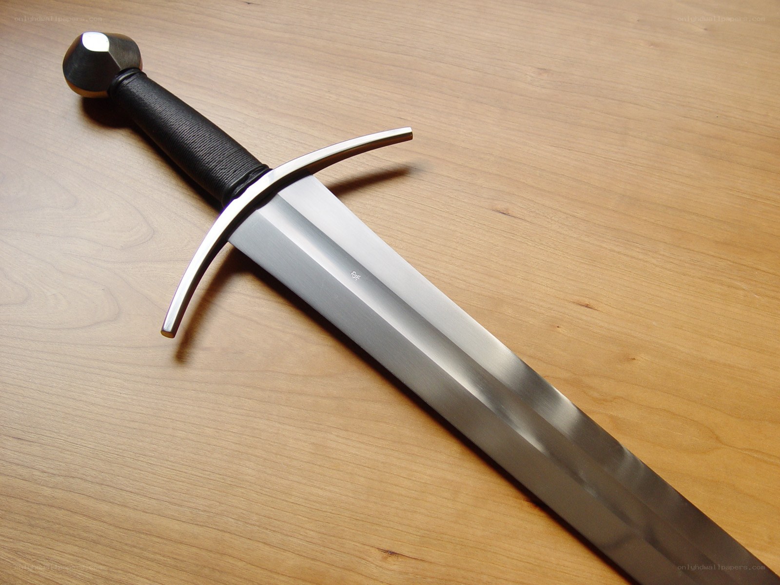 medieval sword on wood