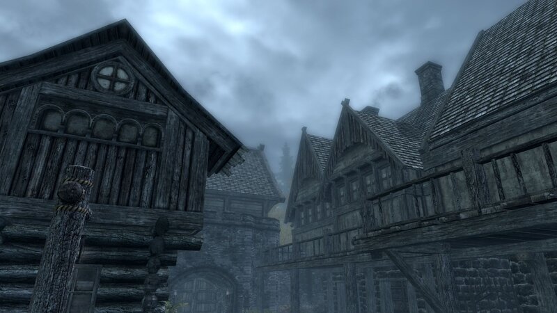 medieval village under cloudy sky