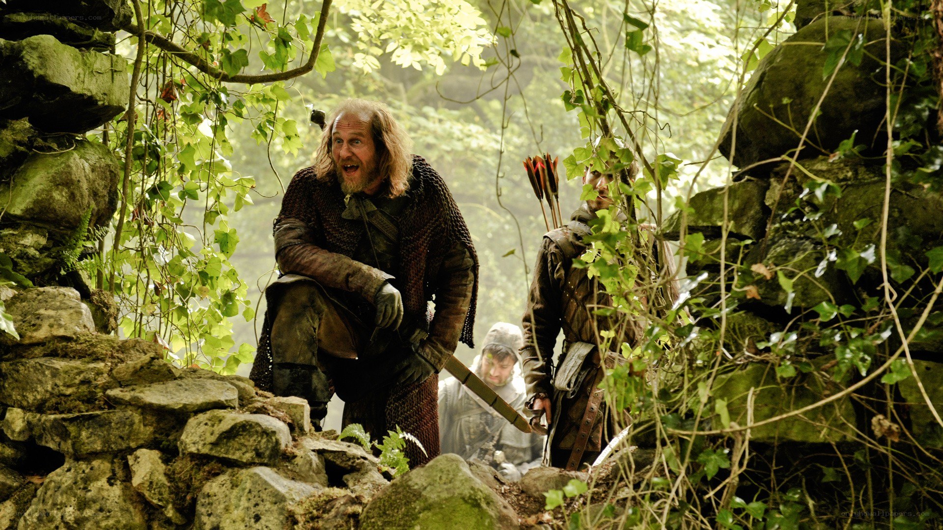 Medieval warriors in forest ruins