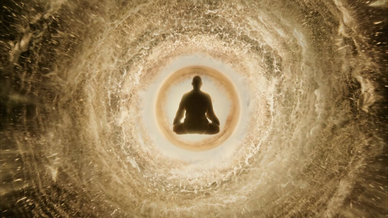 meditating figure in energy vortex