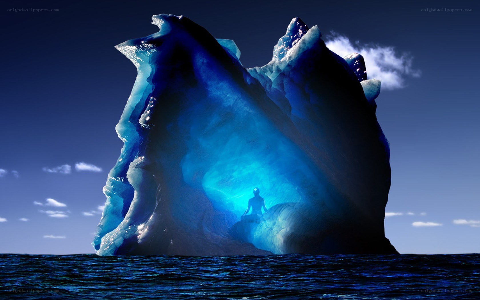 Meditating figure in iceberg