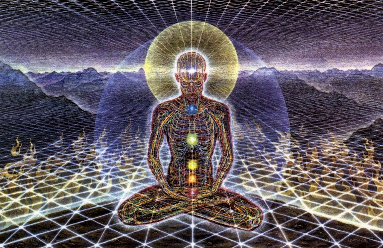 meditating figure with chakras