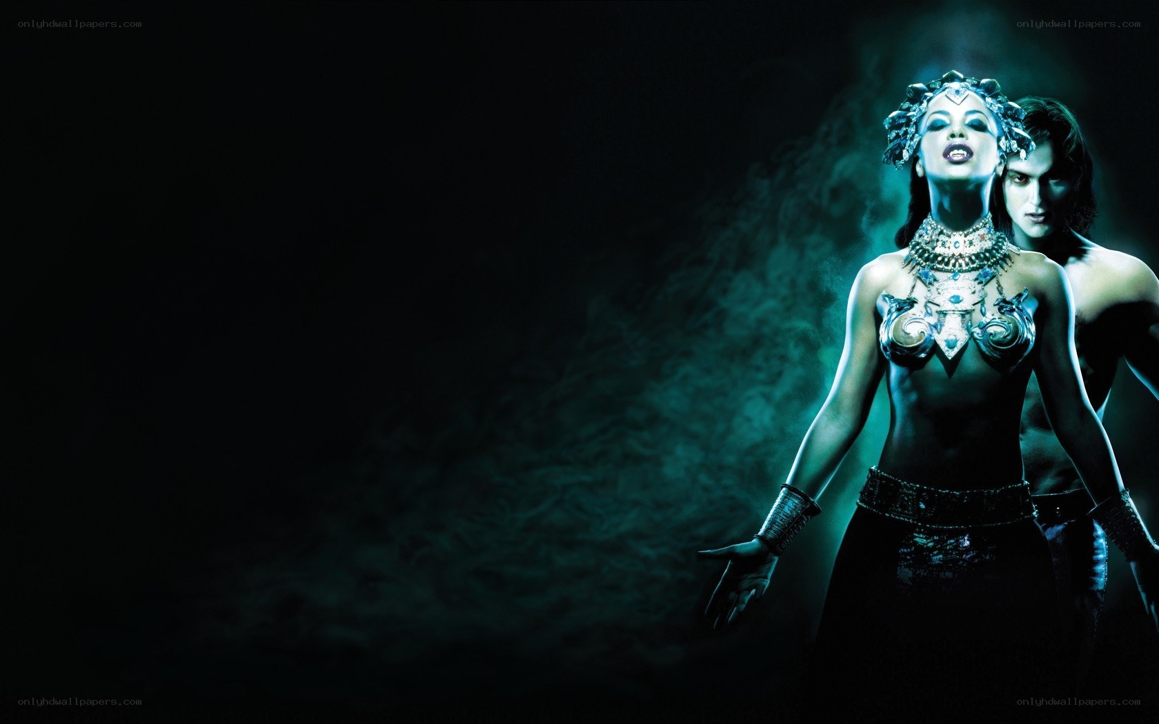 Medusa and a man in dark setting