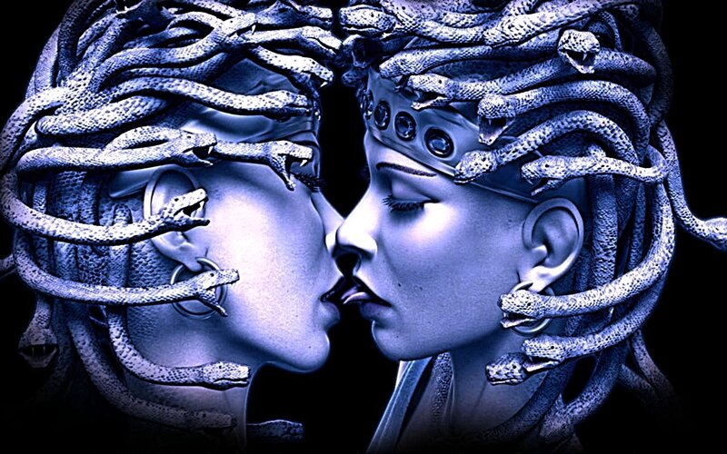 Medusa figures in blue light