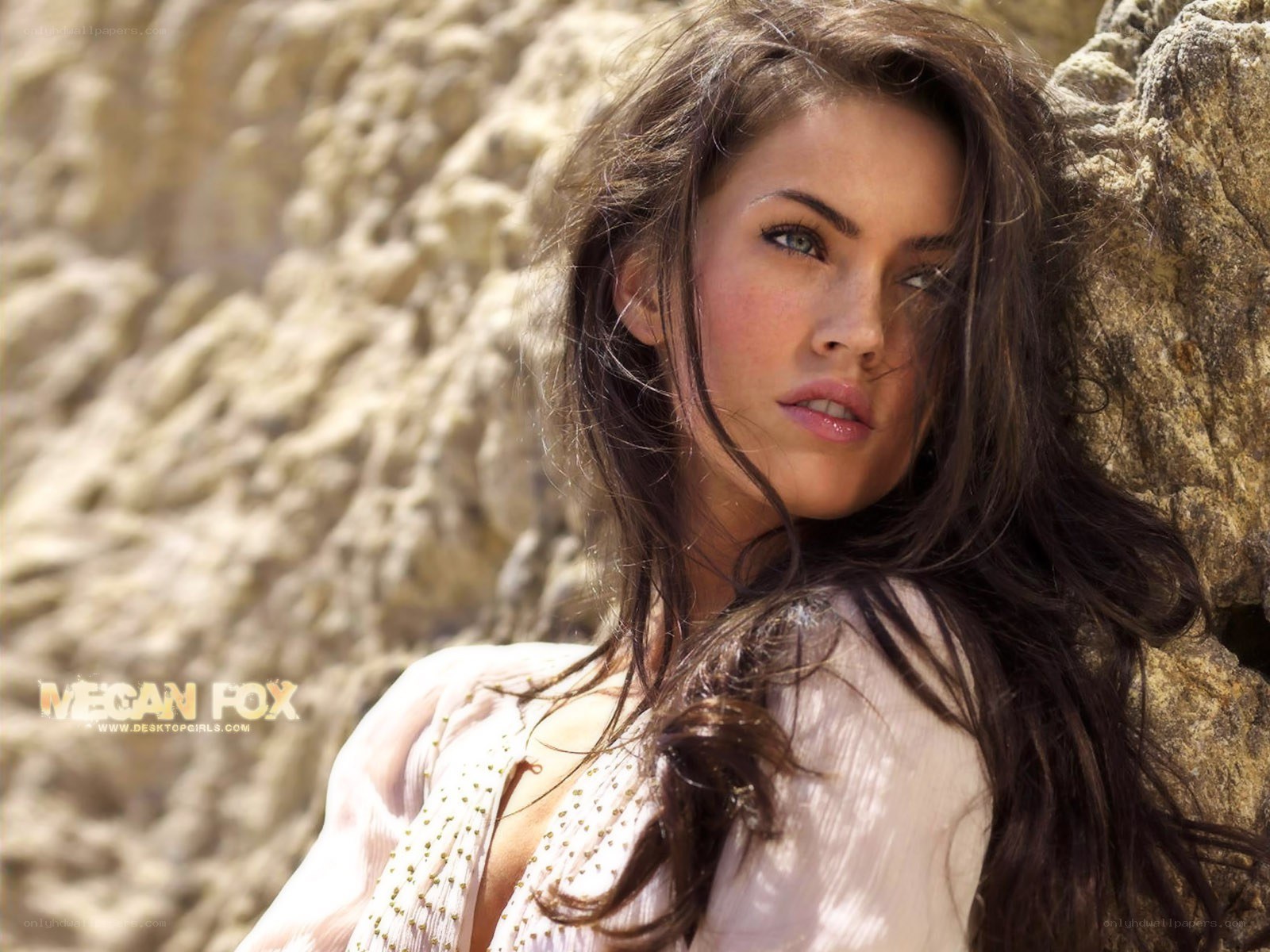 Megan Fox by a rock