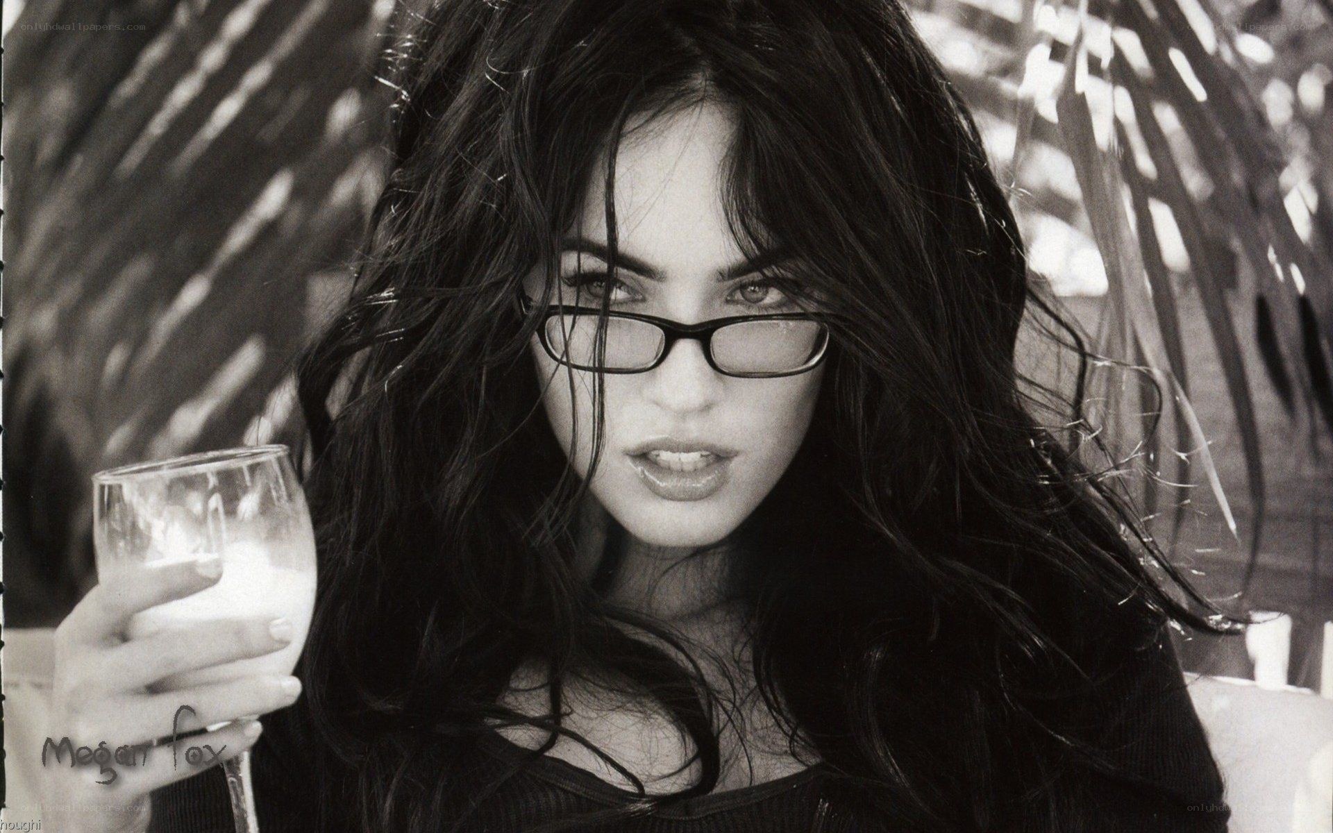 Megan Fox holding a drink