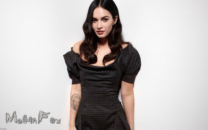 Megan Fox in a plaid dress