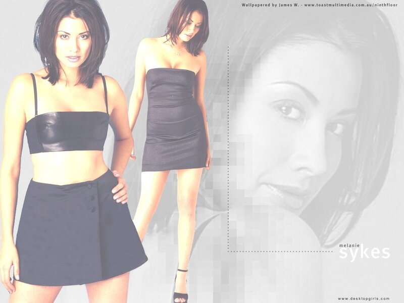Melanie Sykes in black outfit
