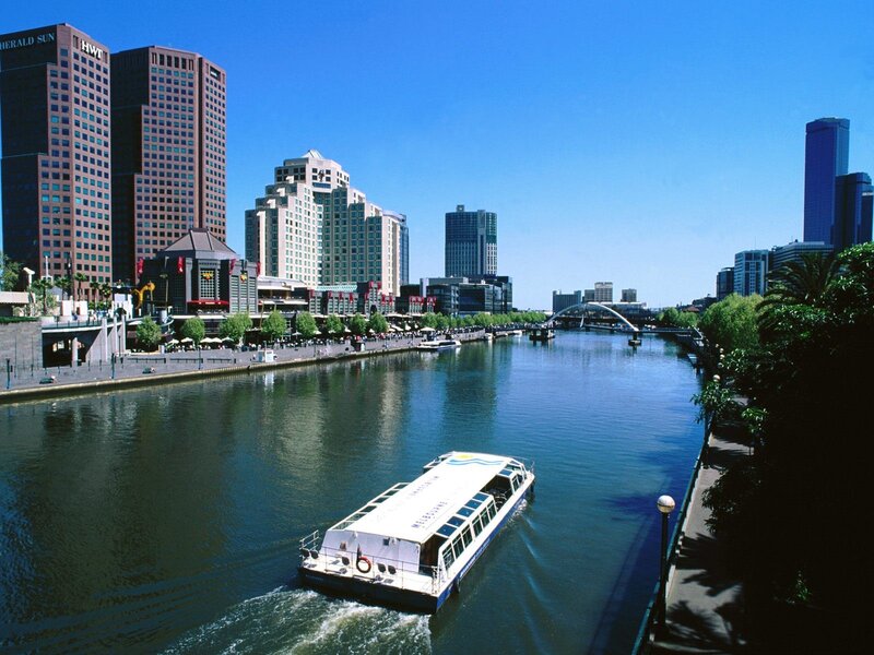 Melbourne cityscape with river cruise