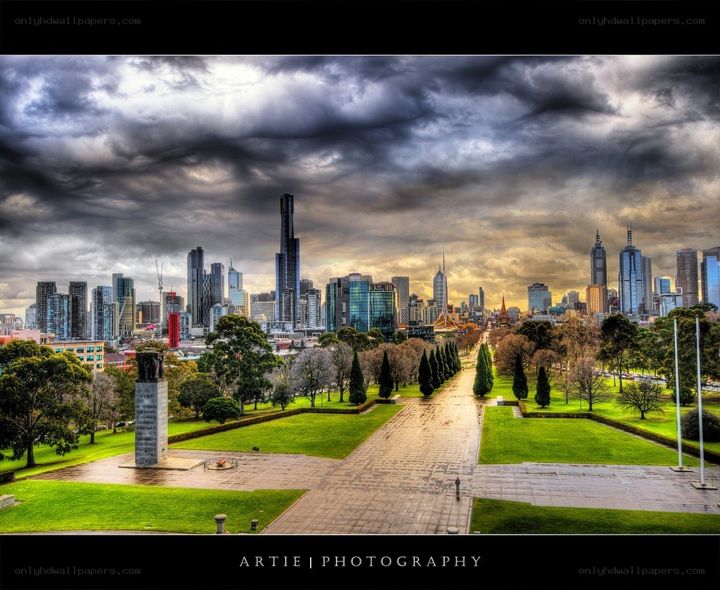 Melbourne skyline under stormy sky