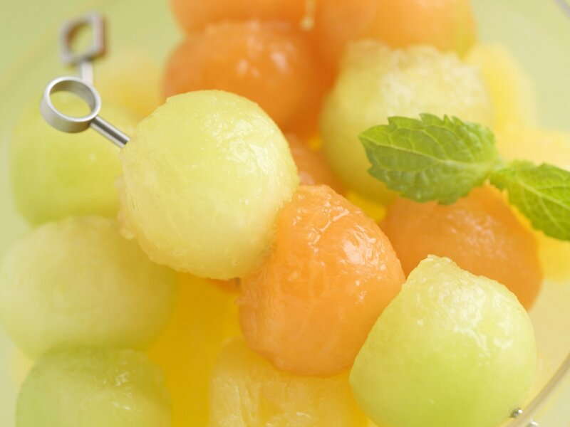 melon balls with mint garnish