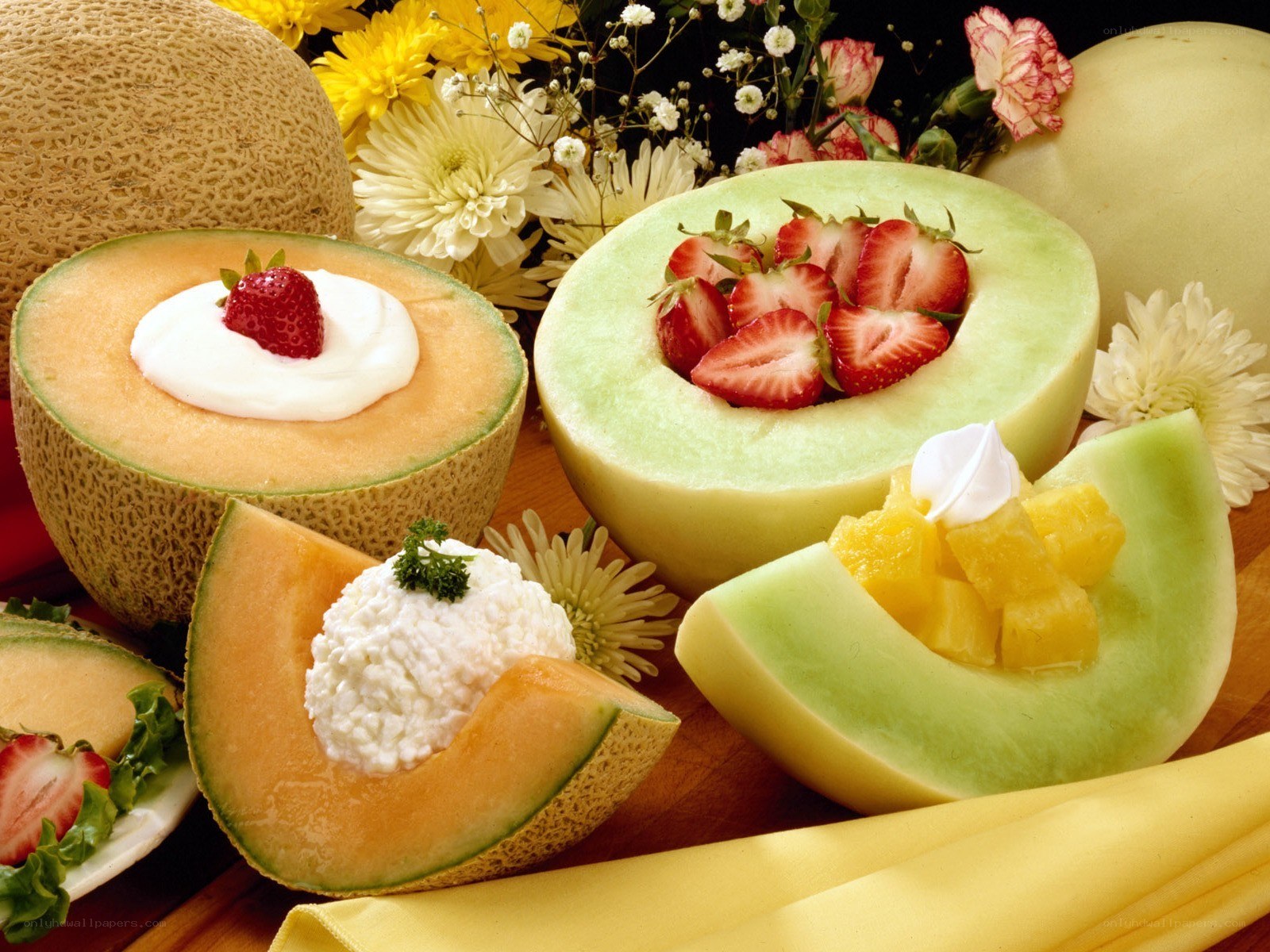 Melon fruit arrangement with strawberries