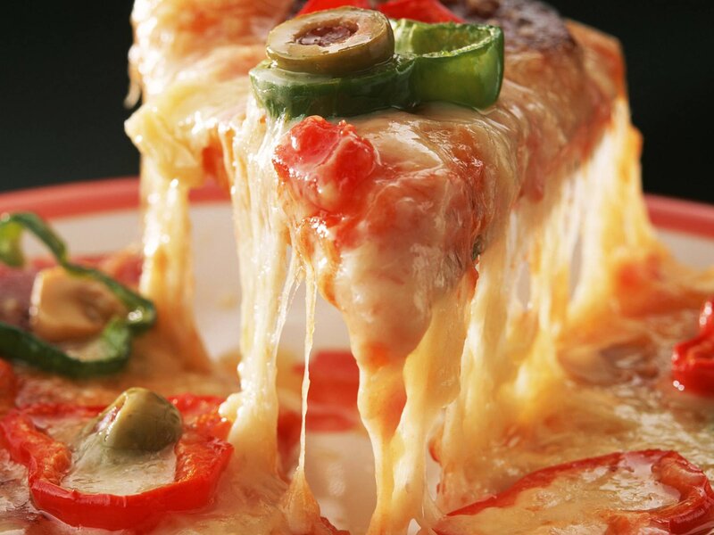 Melted cheese pizza slice