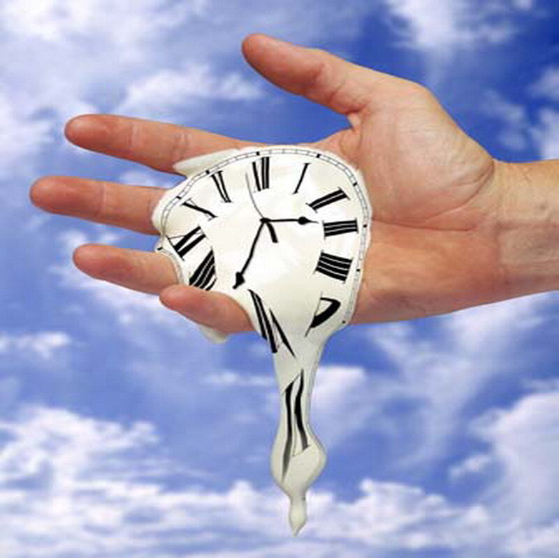 melting clock in hand