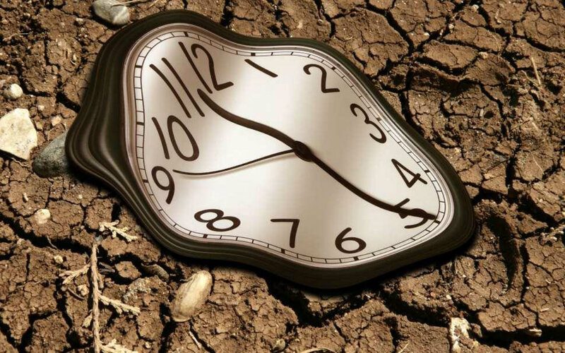 Melting Clock on Dry Ground