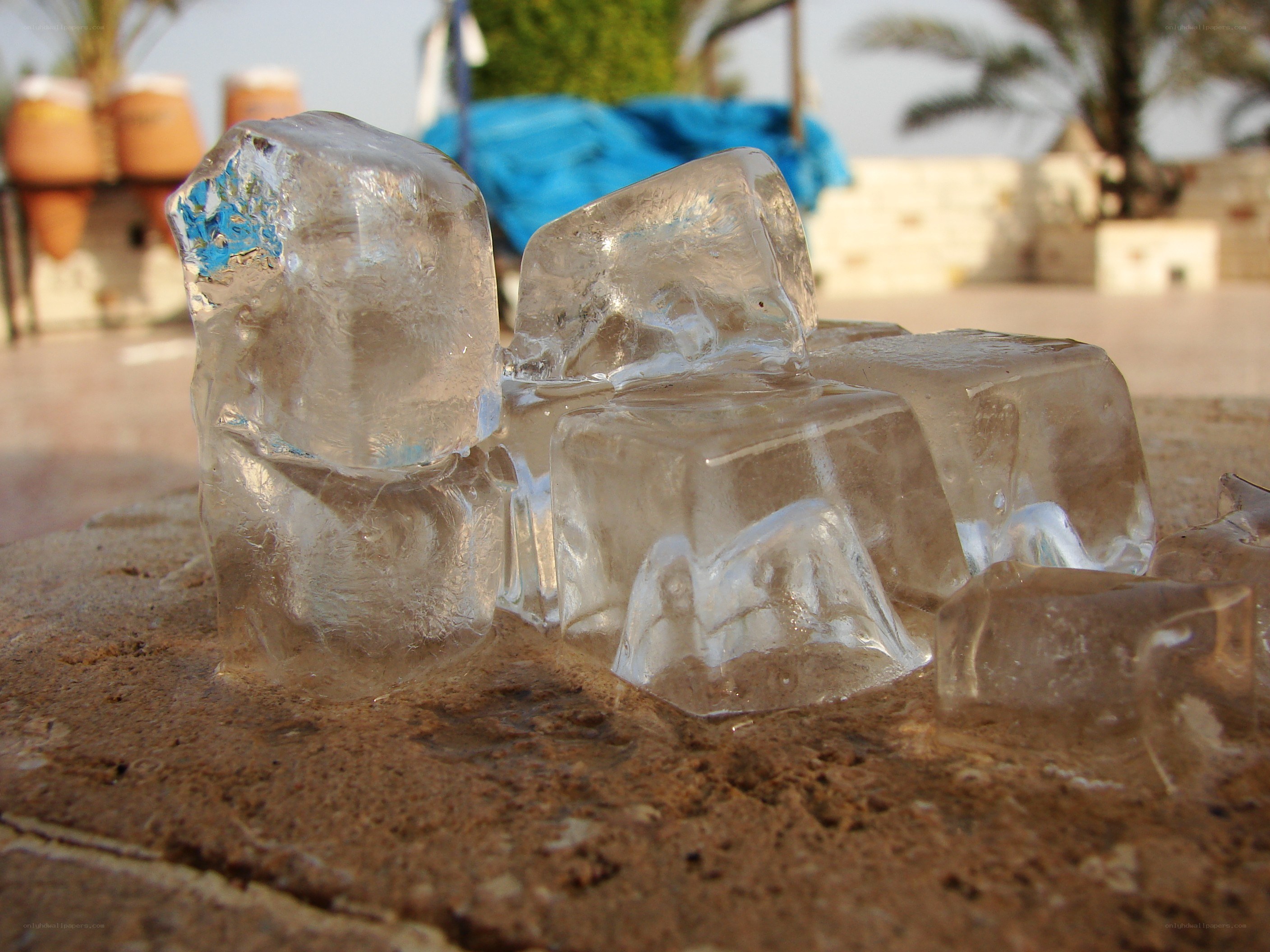 melting ice cubes on stone
