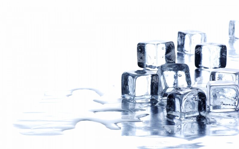 melting ice cubes on white