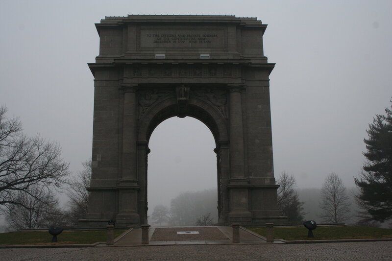 Memorial arch in fog