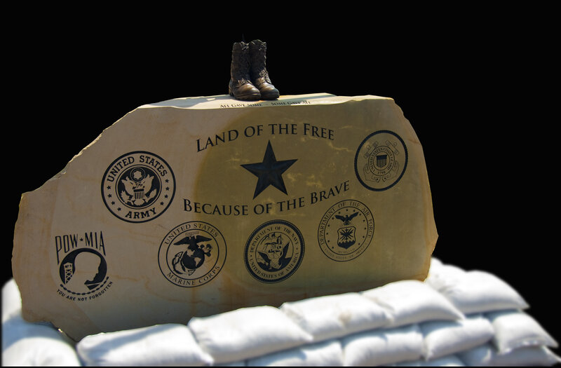 Memorial stone with military insignia