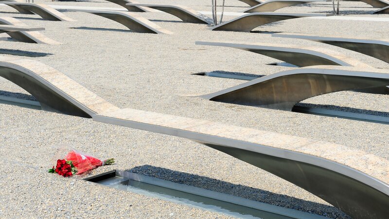 Memorial with red flowers