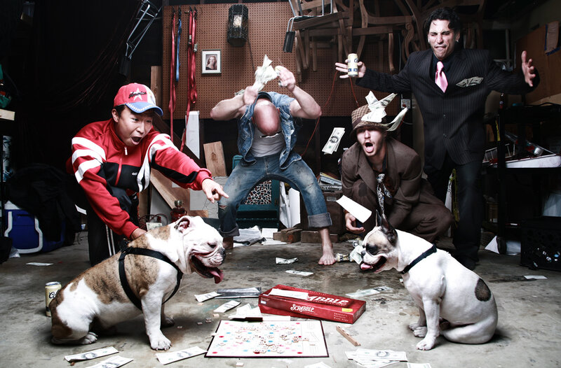 Men and dogs in chaotic room