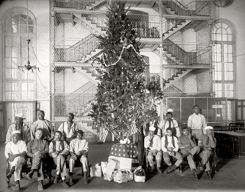 Men around a Christmas tree