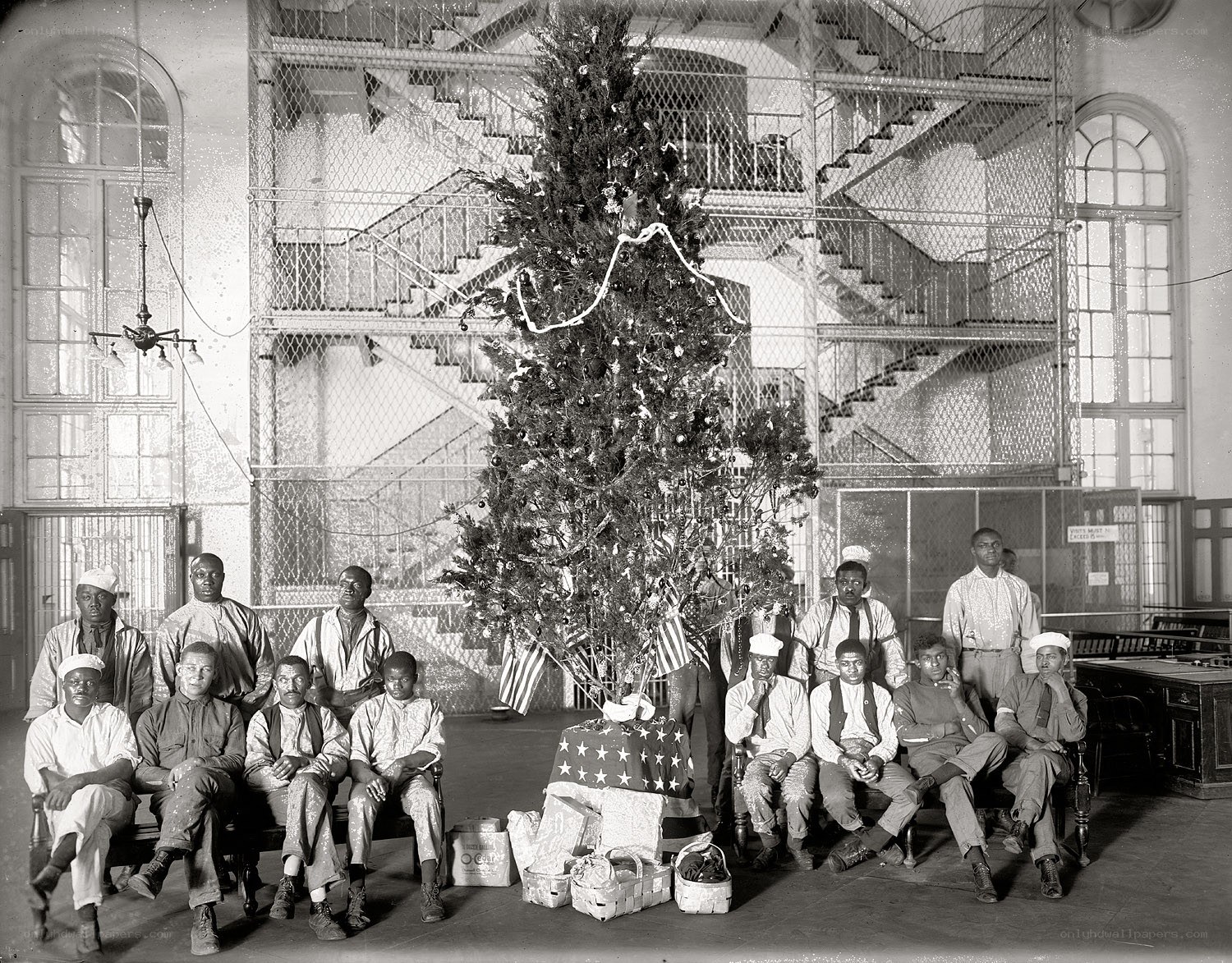 Men around a Christmas tree