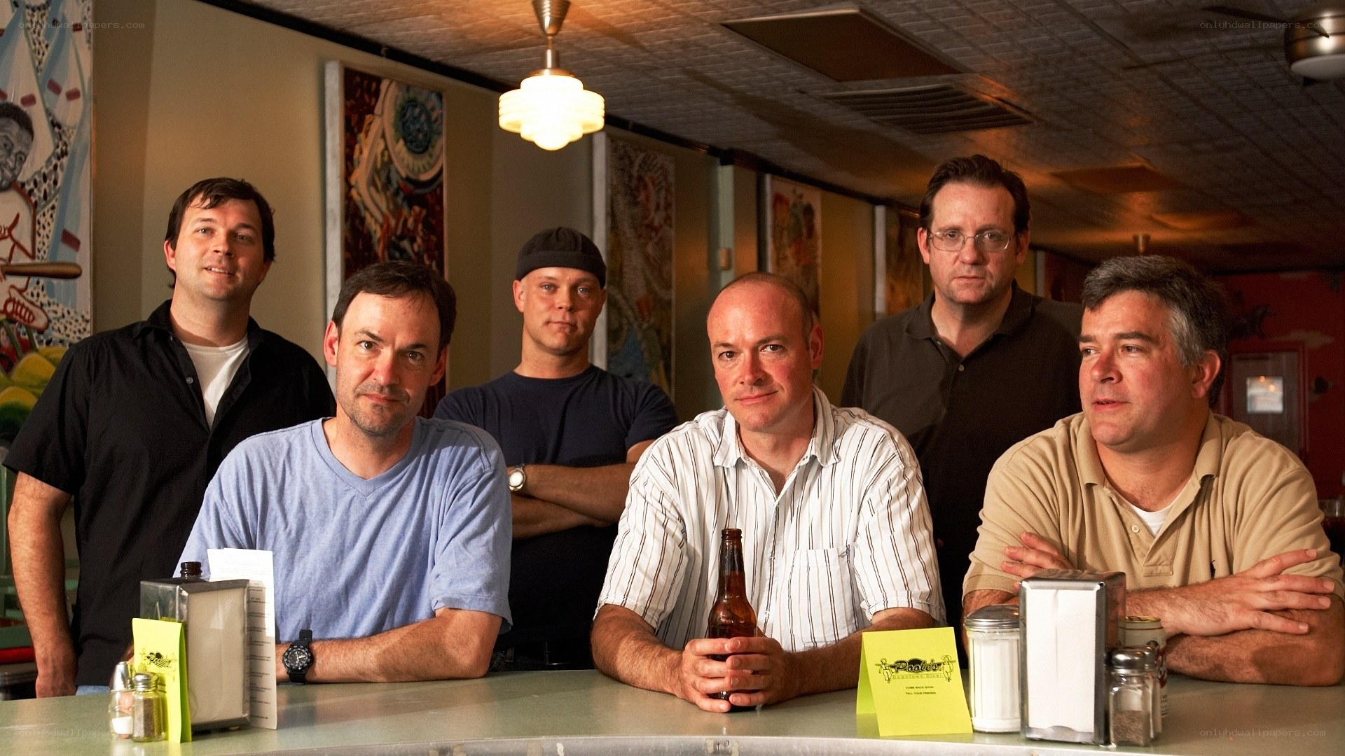 Men at a bar counter