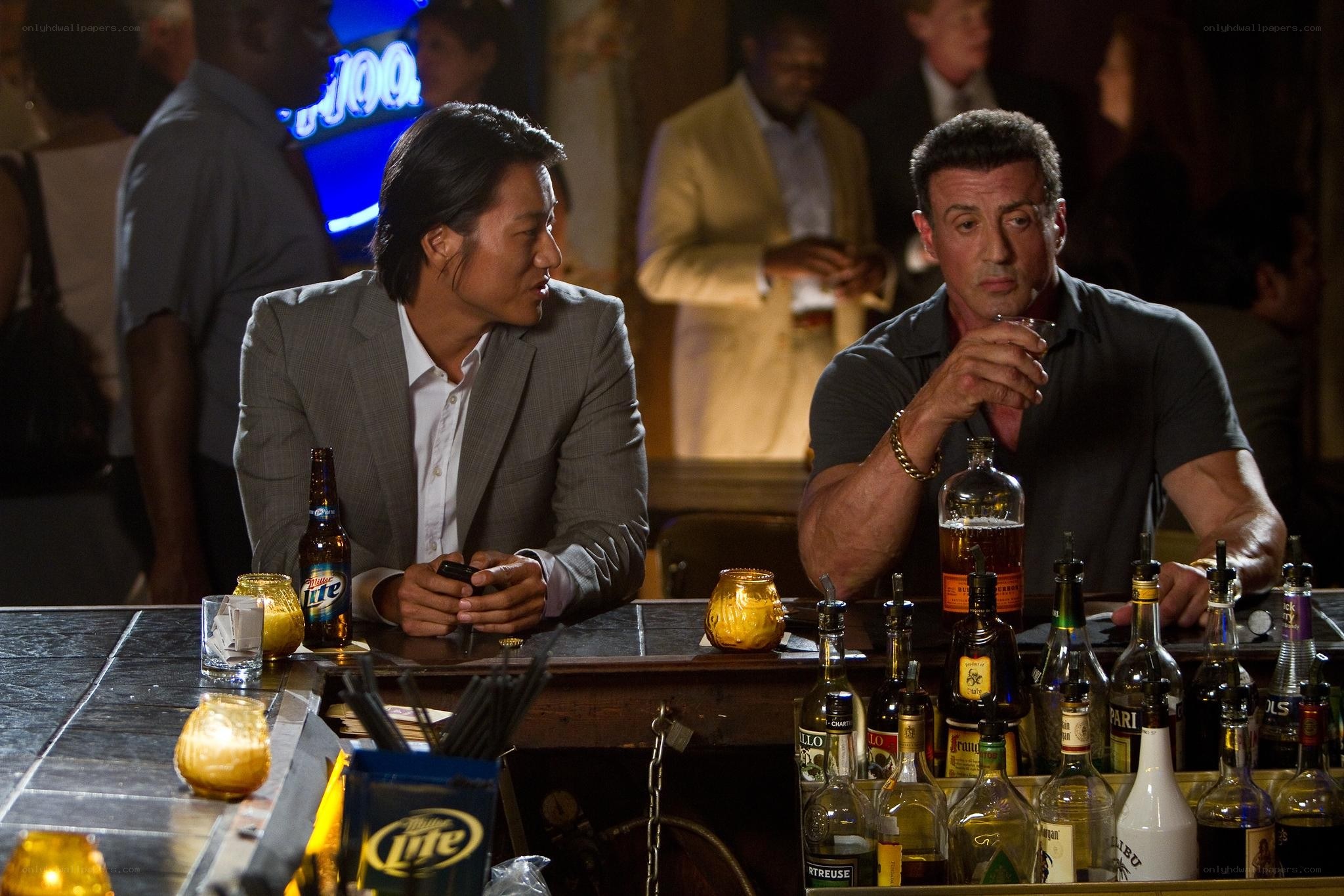 Men at a bar talking