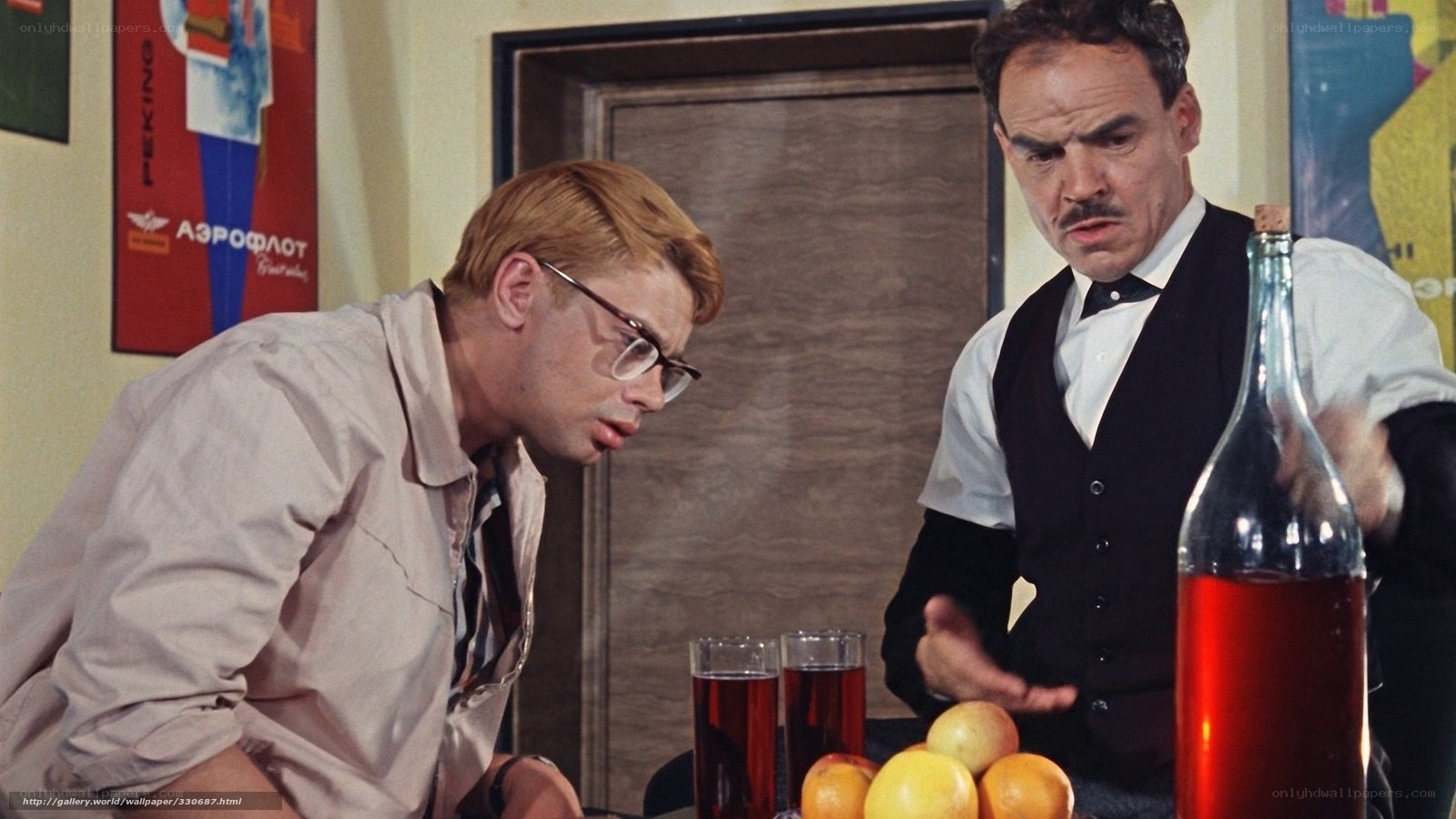 Men at a bar with drinks