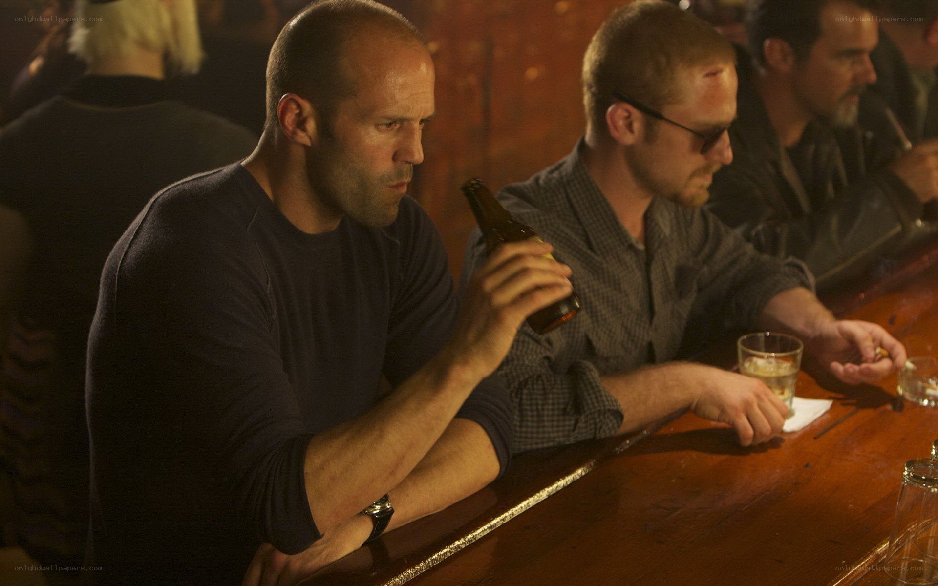 Men at a bar with drinks