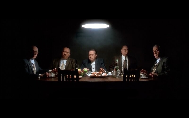 men at a dinner table