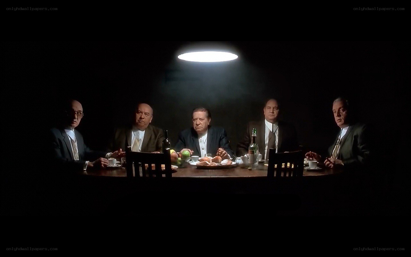 men at a dinner table