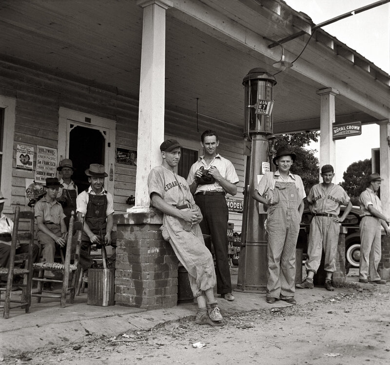 Men at a gas station in the 1940s