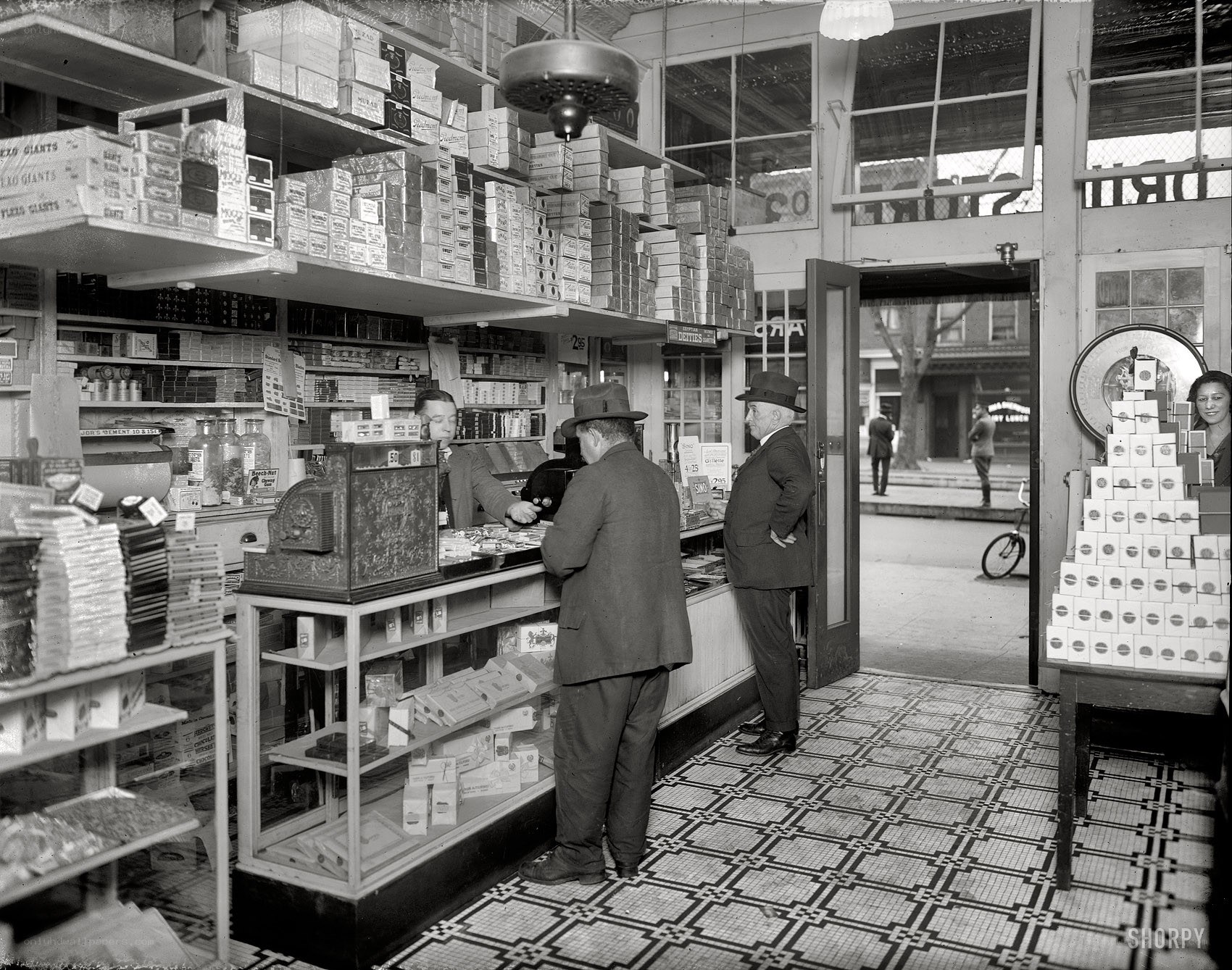 Men at a general store counter