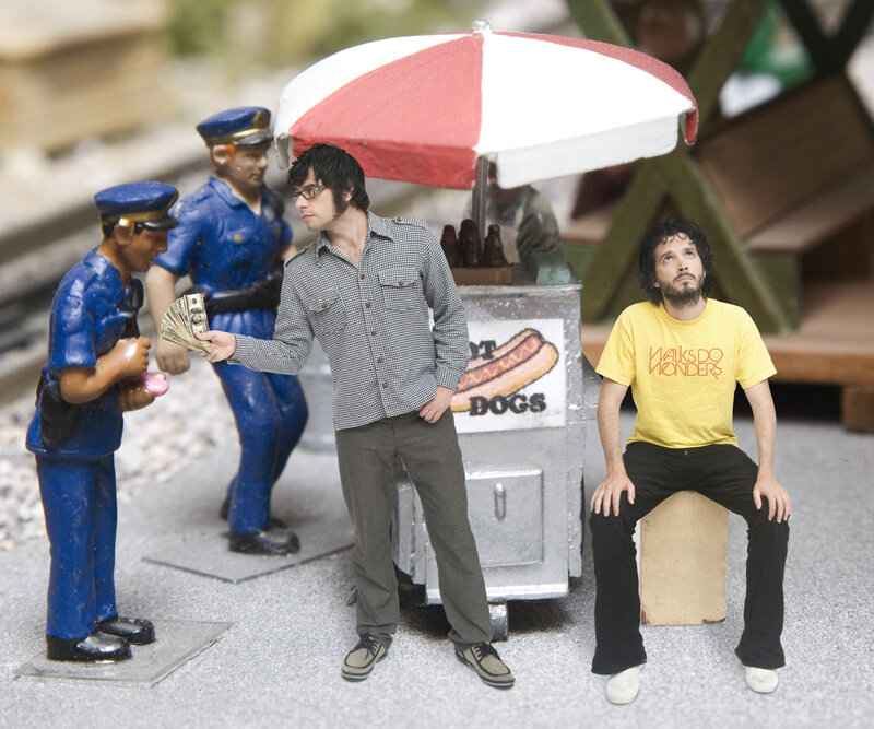 Men at a hot dog stand
