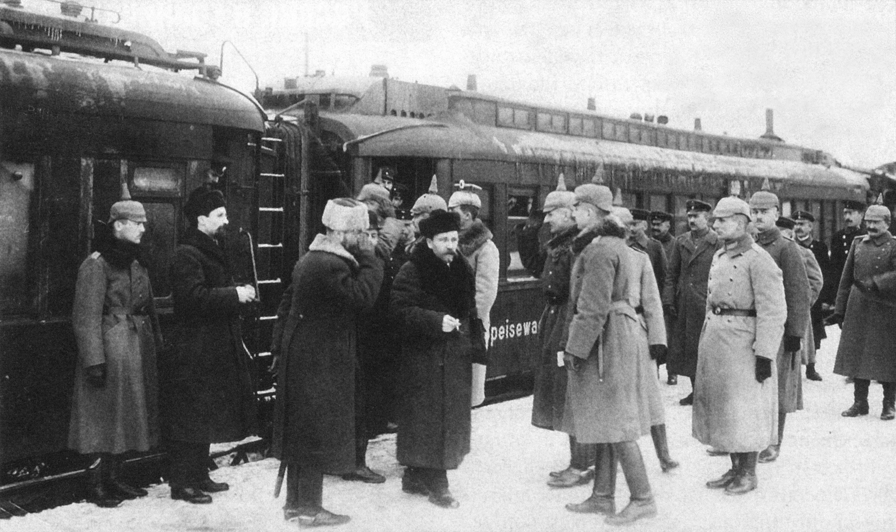 Men at a train station in winter