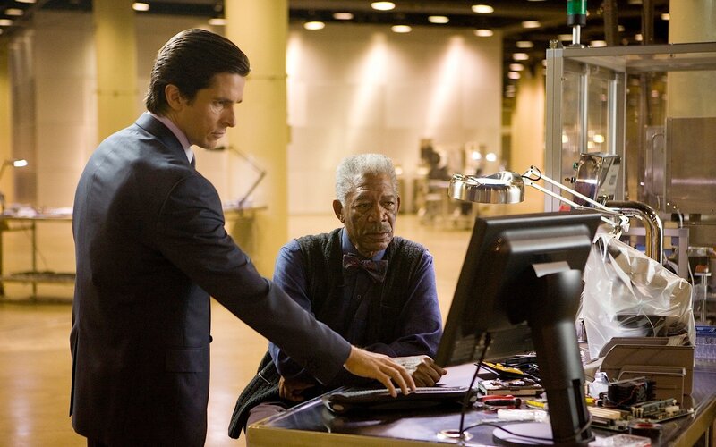 Men at computer workstation