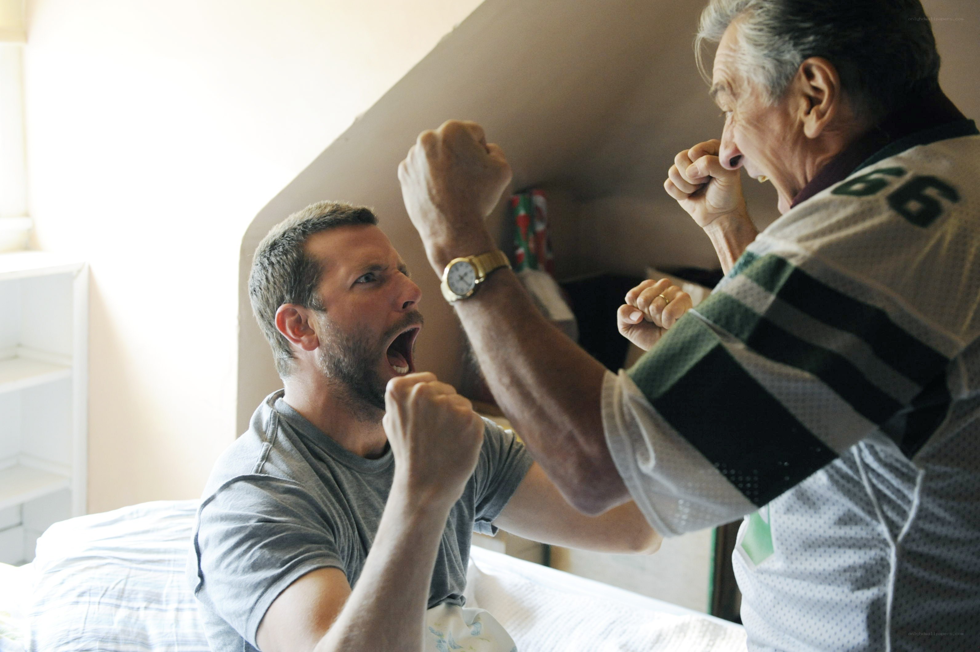 Men celebrating in bedroom