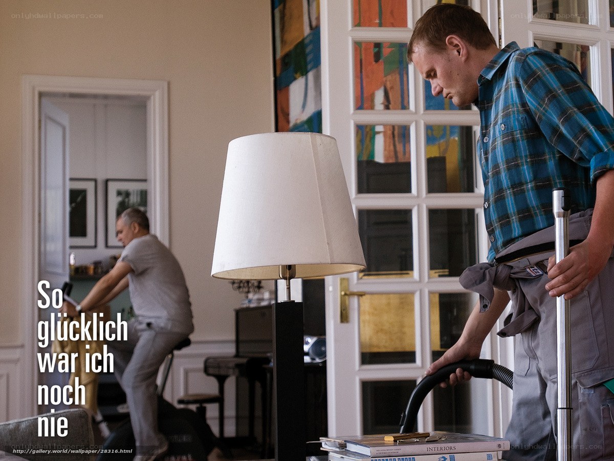 Men cleaning a living room